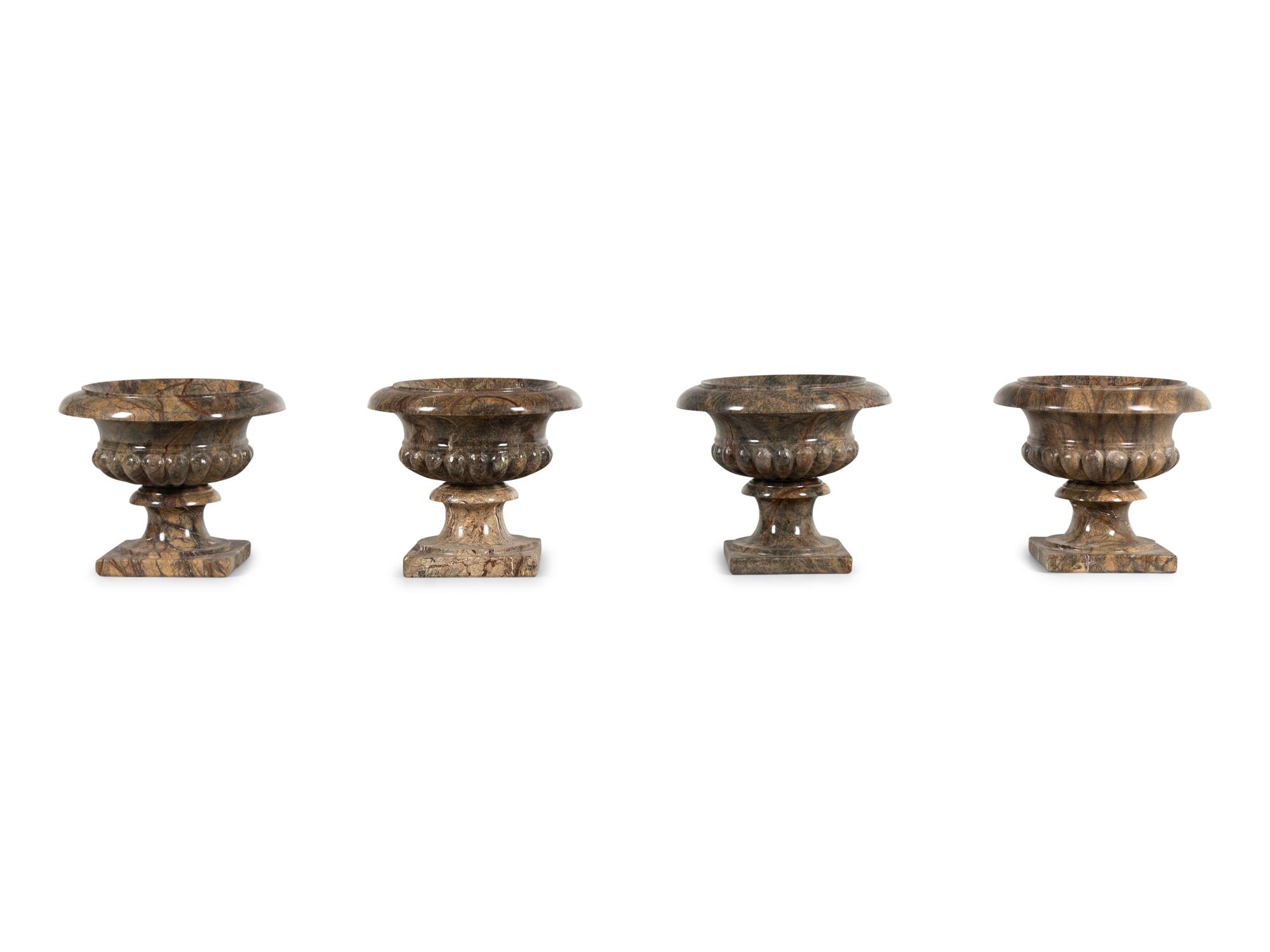 Four Continental Marble Urns