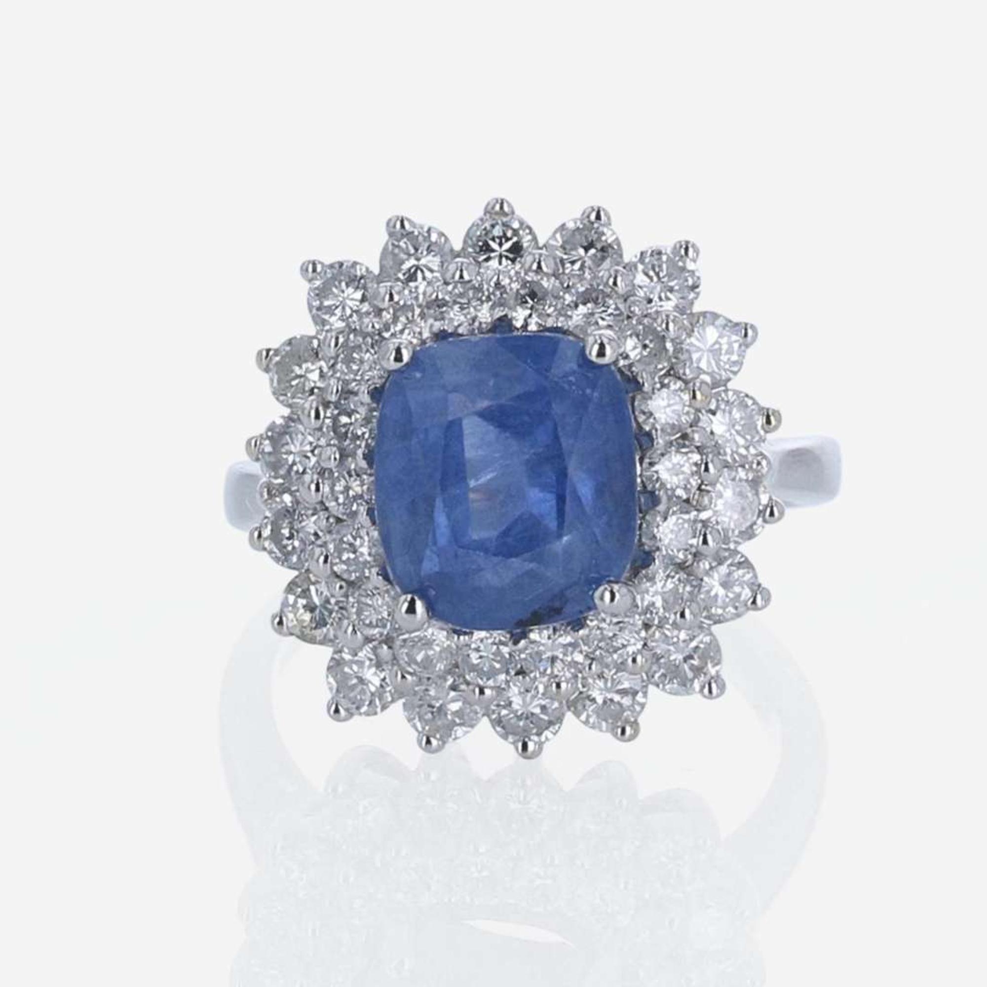 A Sapphire, Diamond, and 18K White Gold Ring