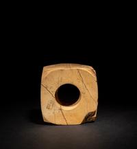A Chinese Archaistic Chicken Bone Jade Cong