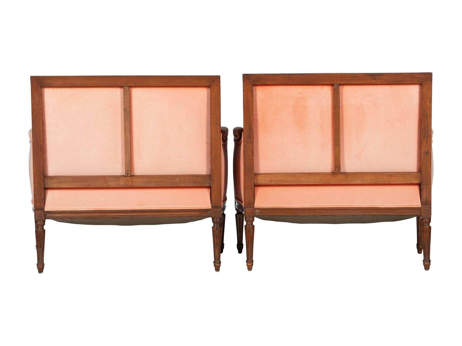 A Pair of Louis XVI Style Walnut Bergeres