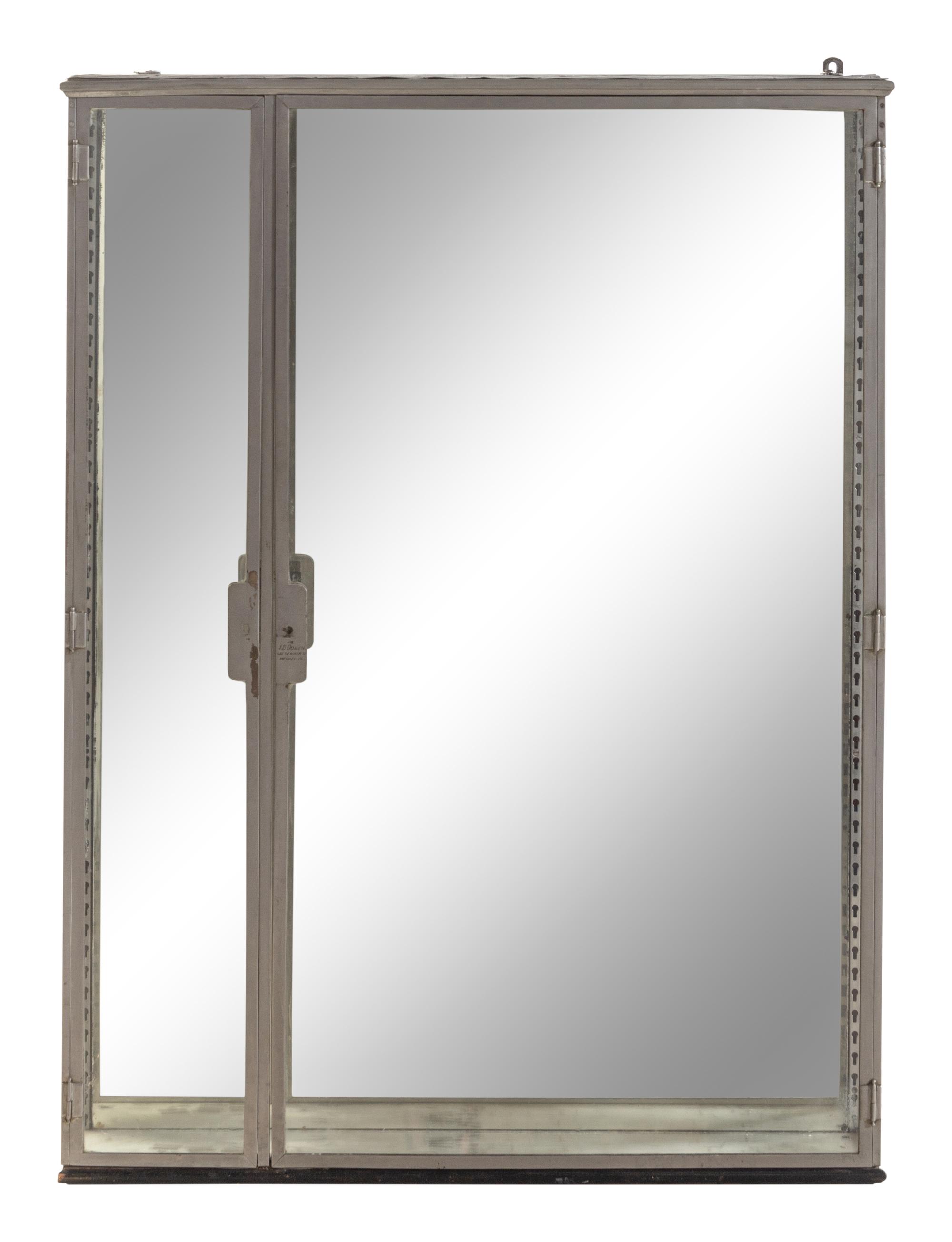 A Belgian Steel and Glass Pharmacy Case with Adjustable Glass Shelves