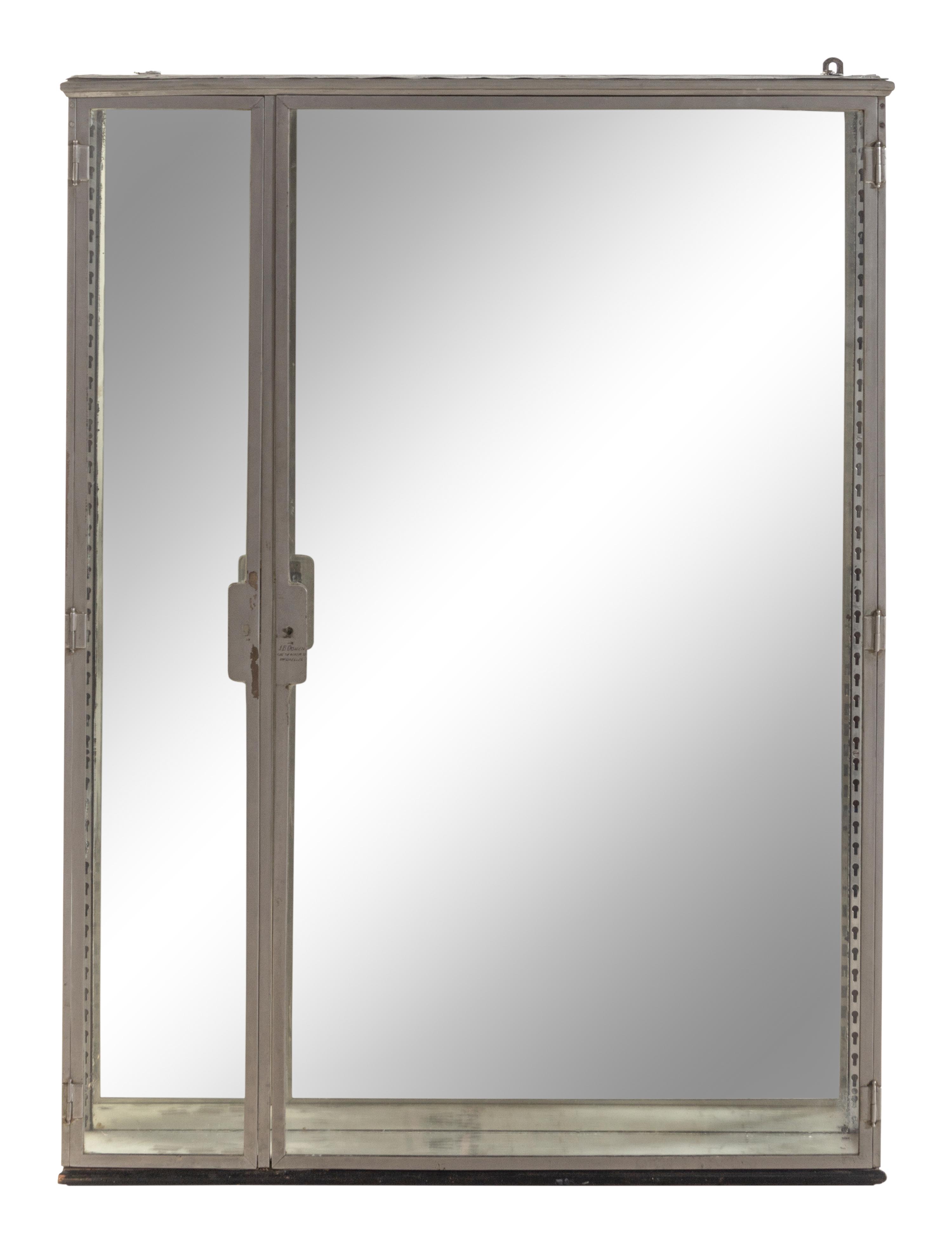 A Belgian Steel and Glass Pharmacy Case with Adjustable Glass Shelves