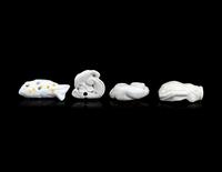 Four Japanese White Glazed Porcelain Animal-Form Netsuke