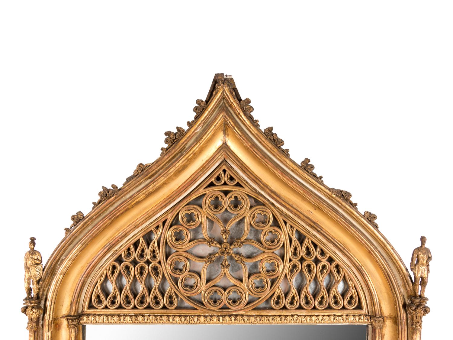 A Continental Gothic Revival Carved Giltwood Mirror