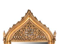 A Continental Gothic Revival Carved Giltwood Mirror