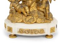 A French Gilt and Patinated Bronze Figural Clock