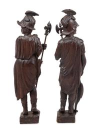 A Pair of Continental Carved Oak Figures of Knights