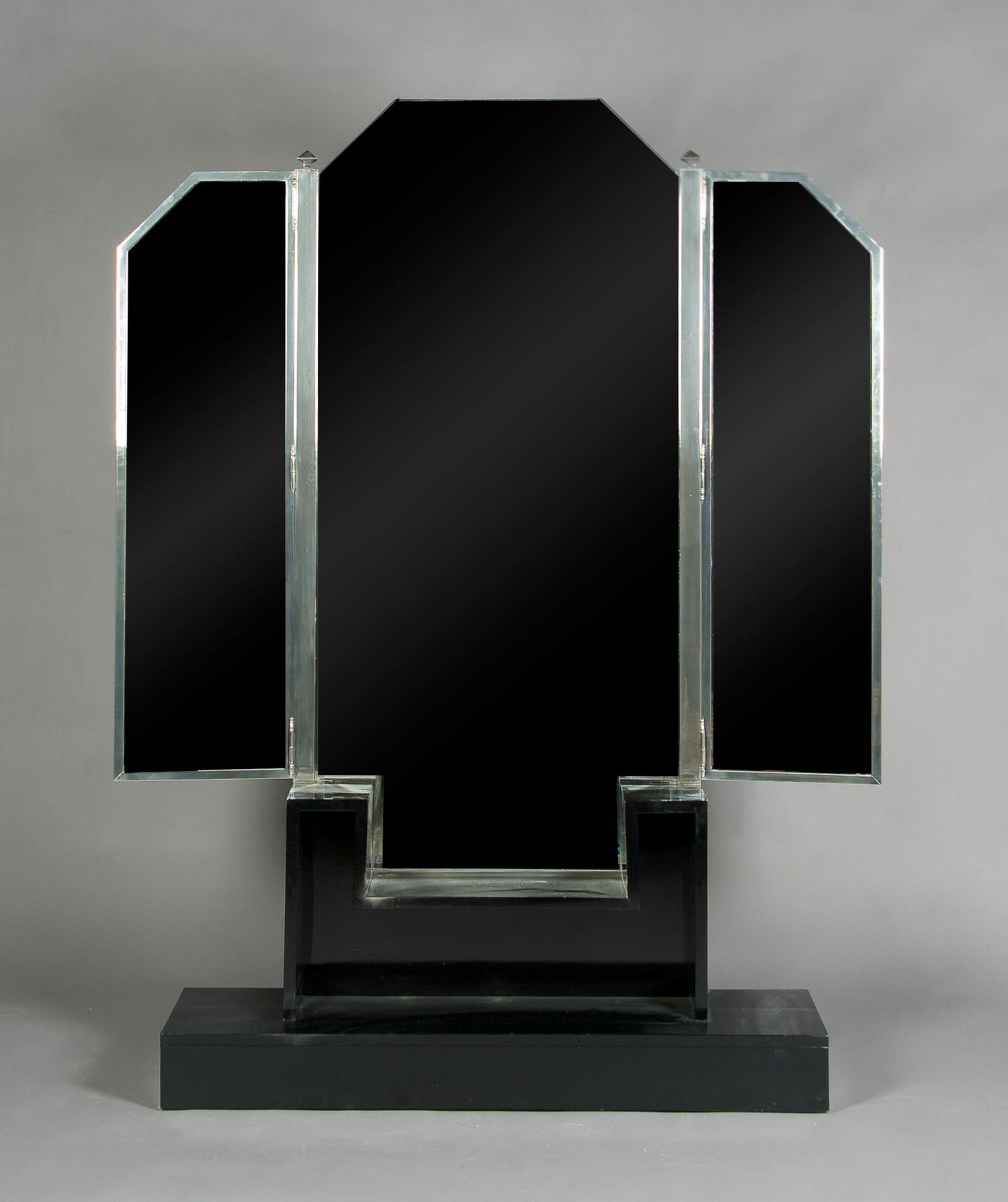 A French Art Deco Ebonized Vanity, Height 74 x width 47 inches.