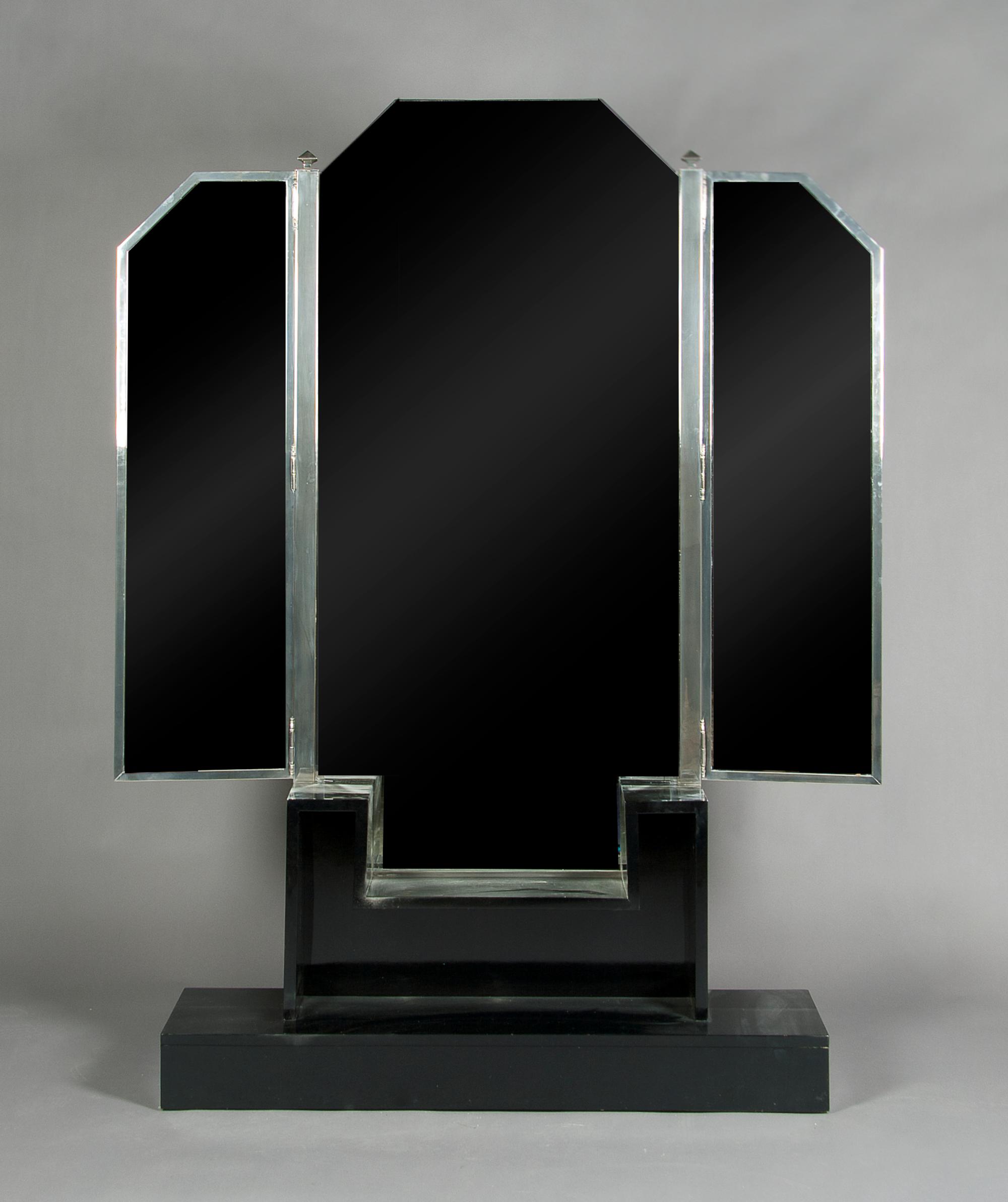 A French Art Deco Ebonized Vanity, Height 74 x width 47 inches.