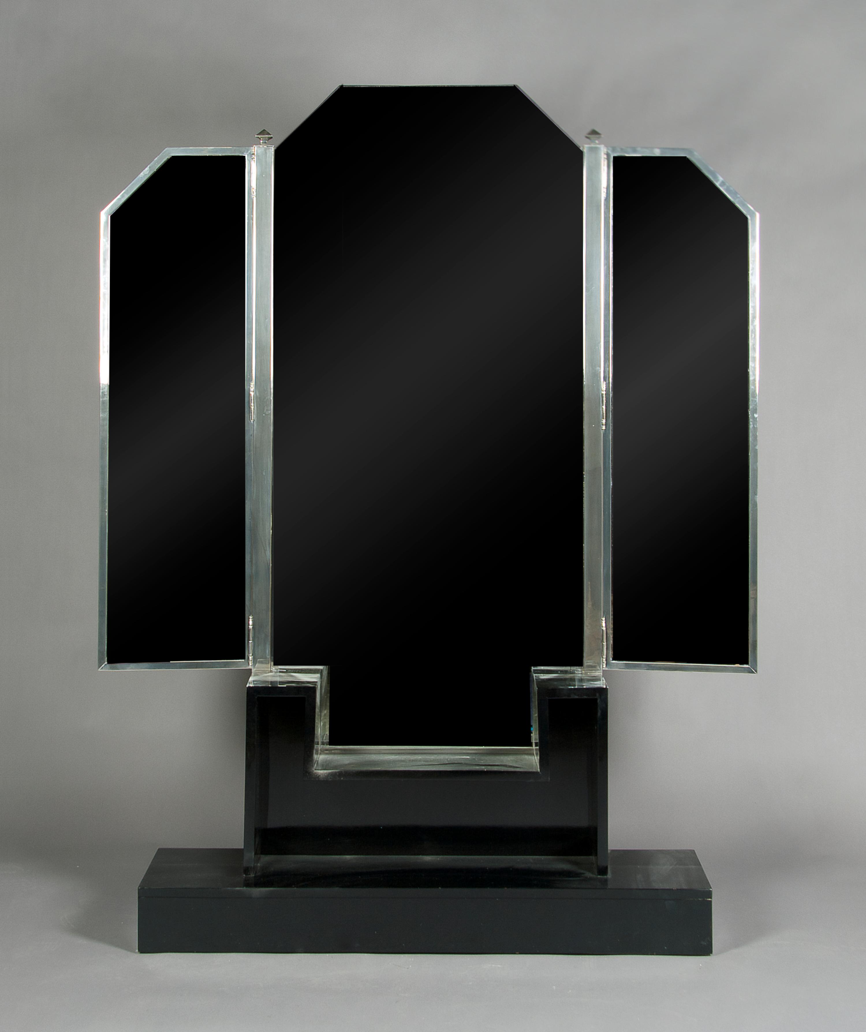 A French Art Deco Ebonized Vanity, Height 74 x width 47 inches.