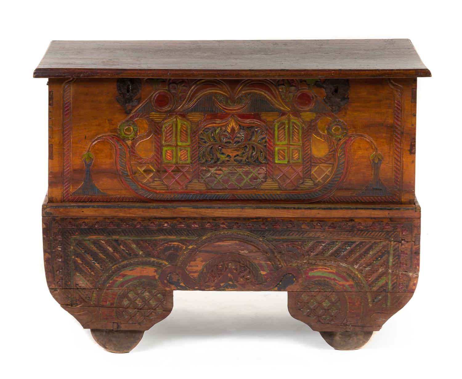 An Indian Carved and Polychromed Marriage Chest Height 37 x width 41 x depth 17 inches.