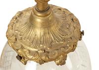 A Set of Four Gilt Bronze and Cut Glass Pendant Lights