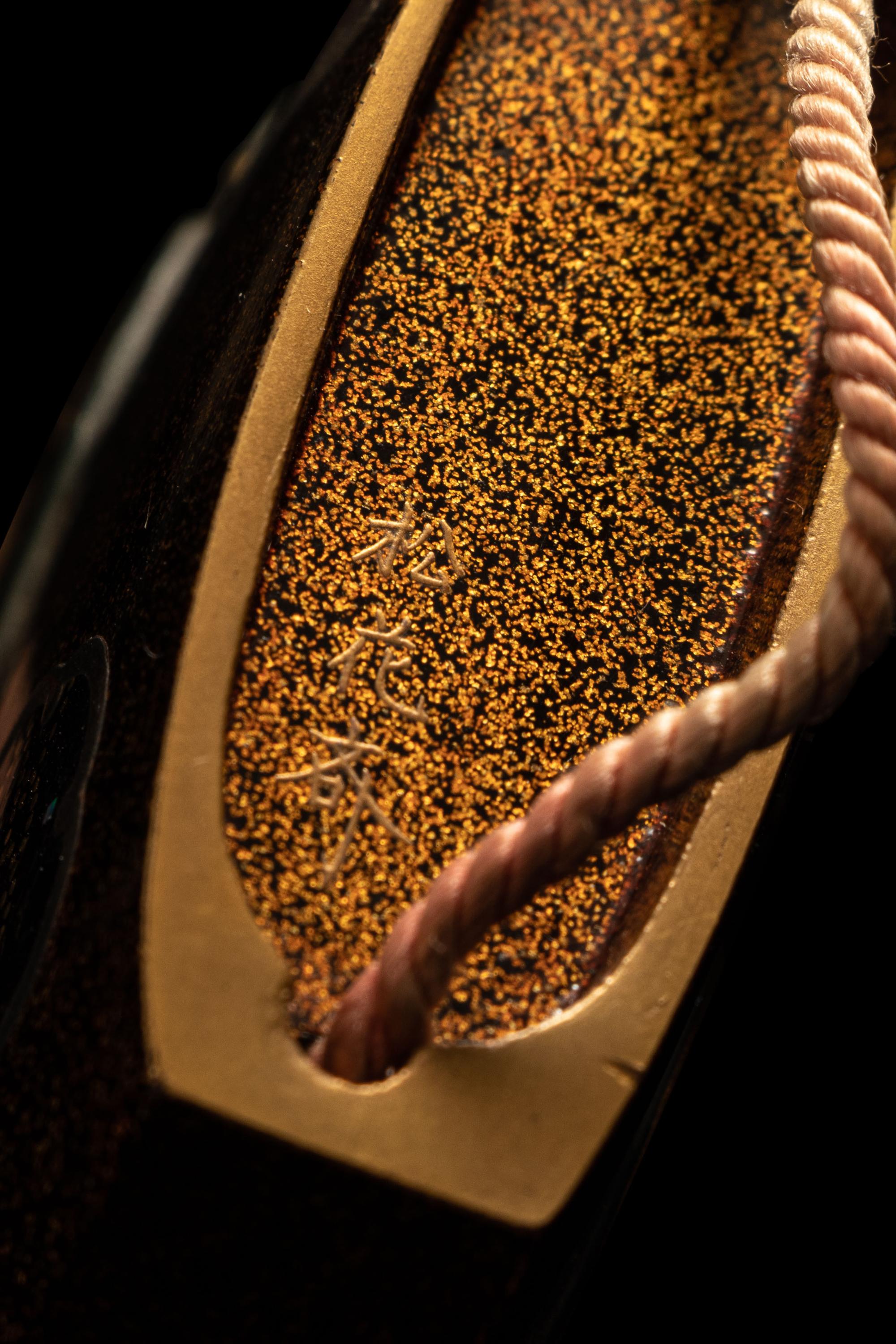 A Large Japanese Gold, Red and Black Lacquer Three-Case Inro