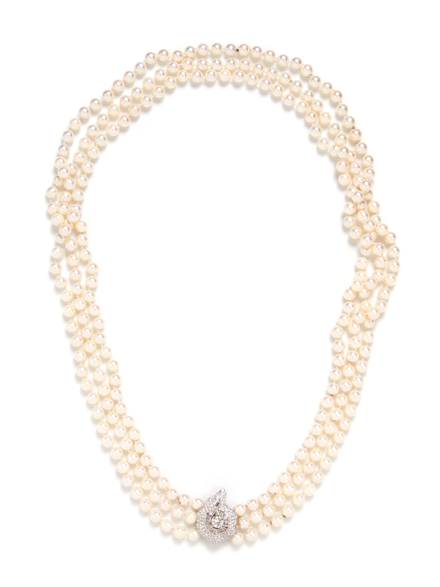 A Triple Strand Cultured Pearl Necklace with White Gold and Diamond Clasp,