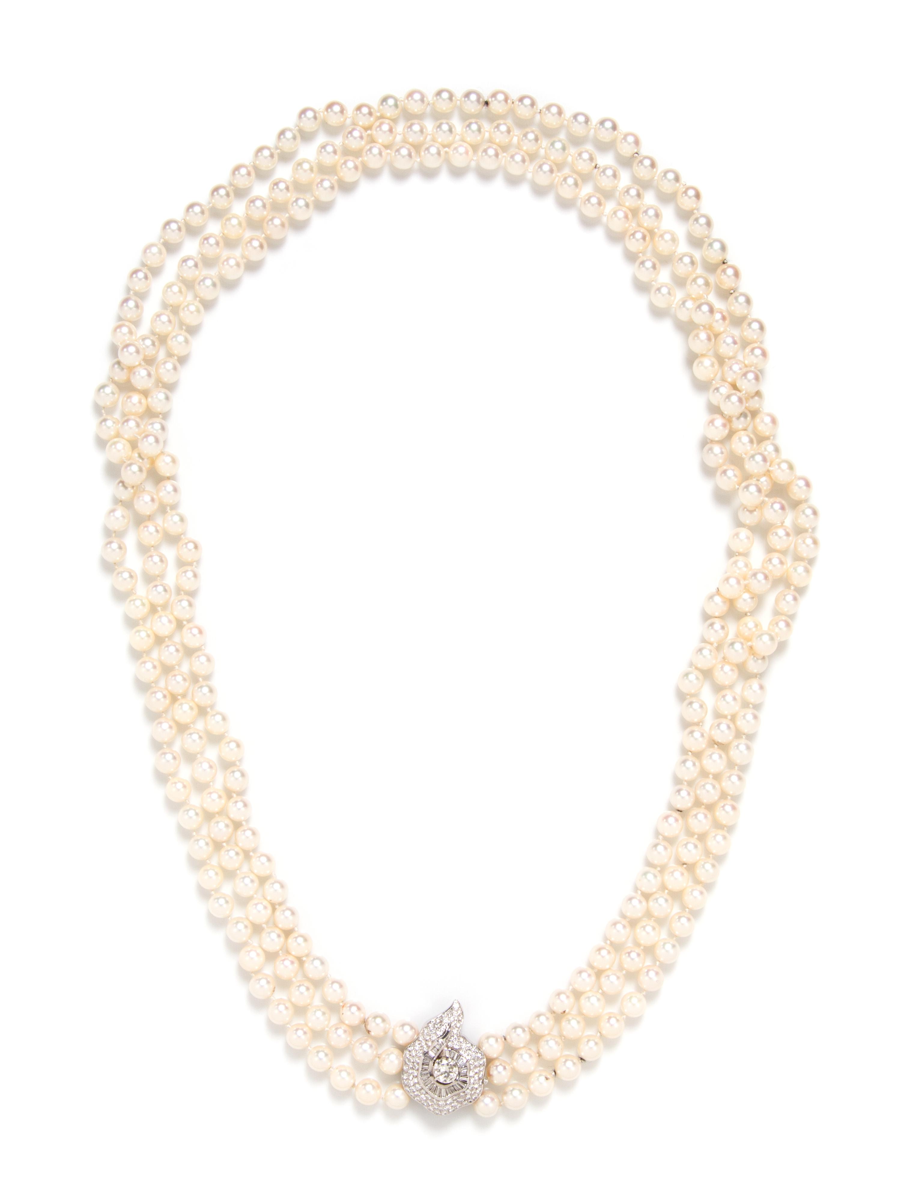 A Triple Strand Cultured Pearl Necklace with White Gold and Diamond Clasp,
