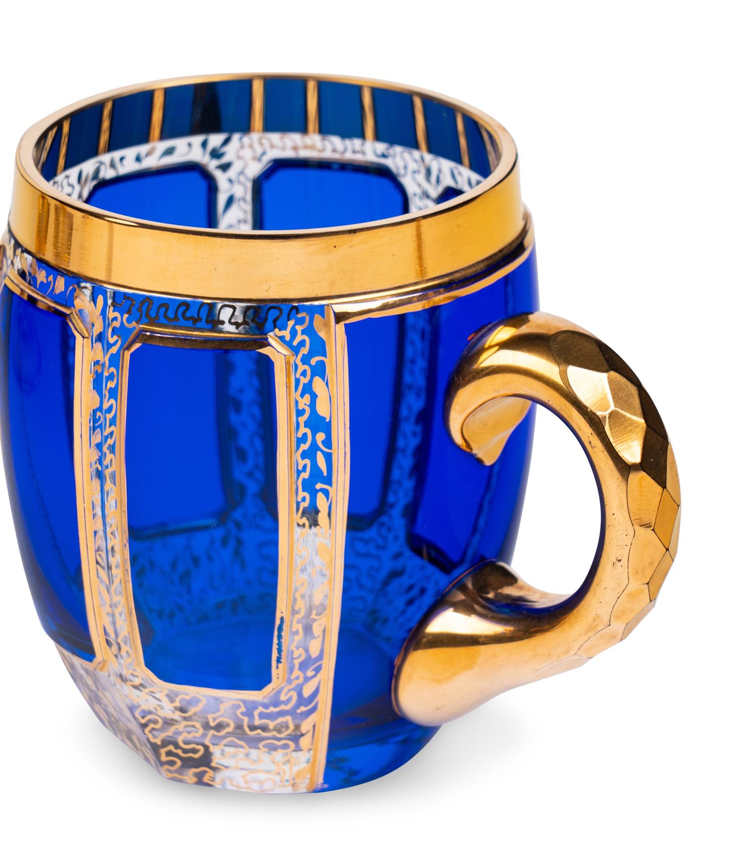 A Set of Moser Cobalt Blue and Gilt Decorated Glass Stemware