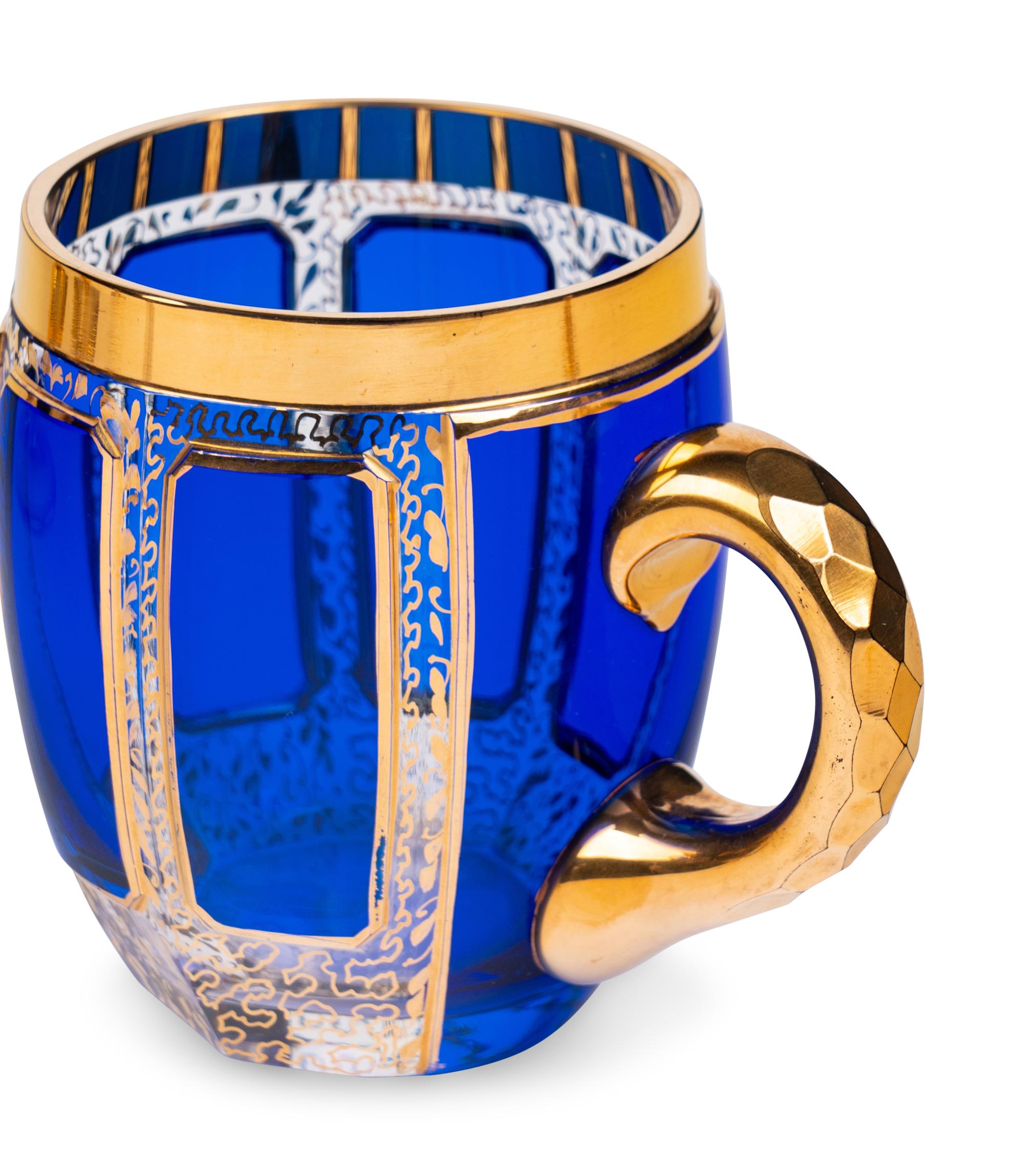 A Set of Moser Cobalt Blue and Gilt Decorated Glass Stemware