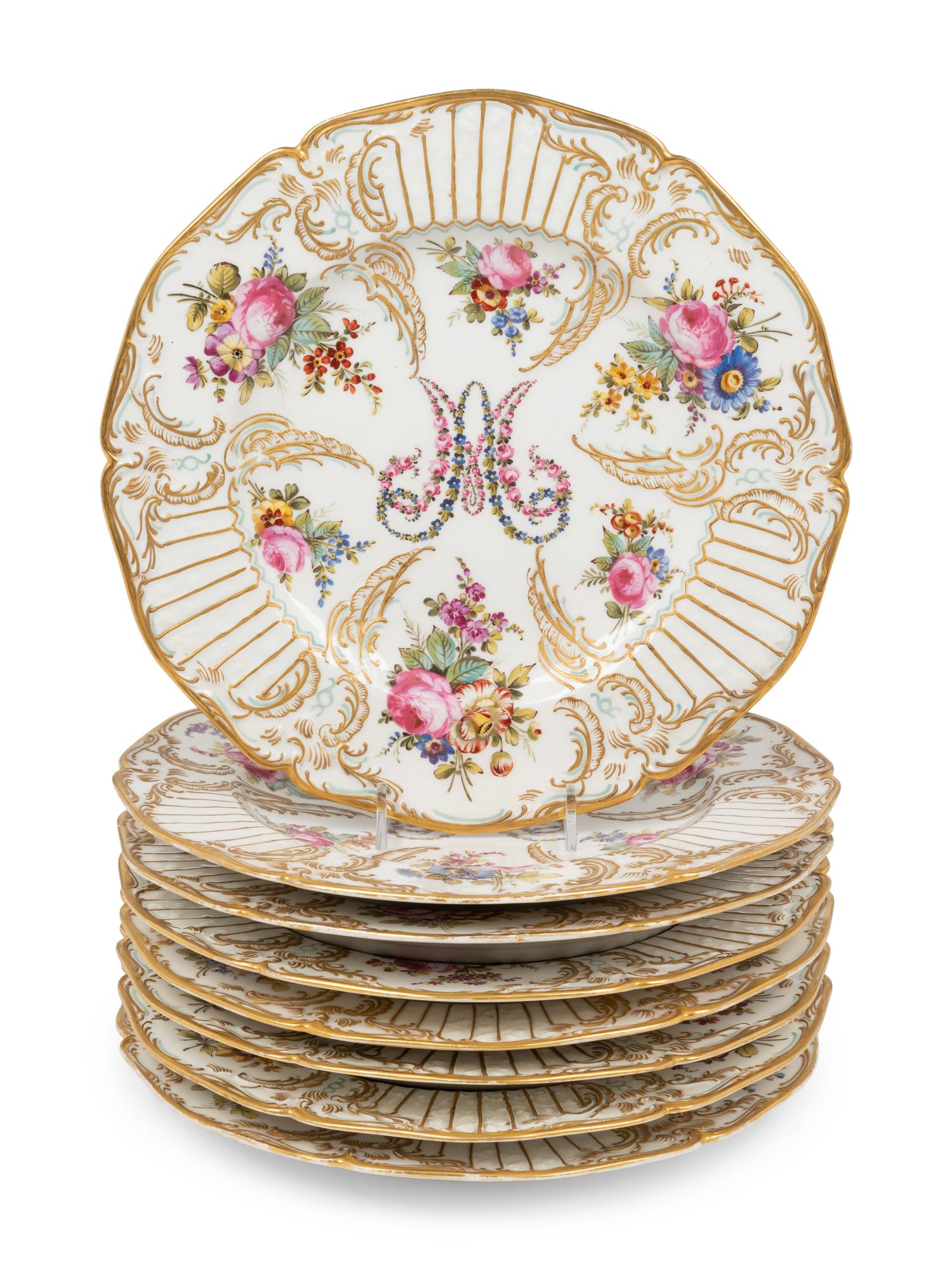 A Set of Eight French Porcelain Plates
