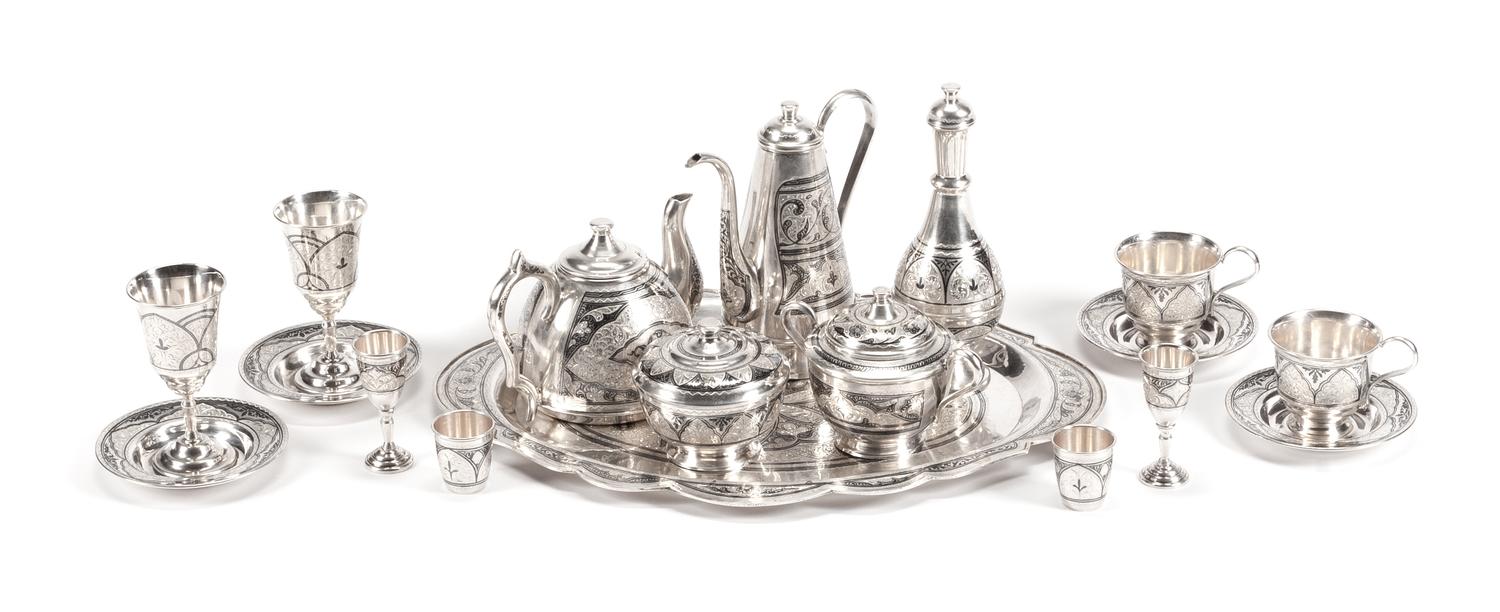 An Extensive Indian Silver-Plate Tea, Coffee and Dessert Service, Late 19th/Early 20th Century, comprising 2 coffee pots, 1 teapot, 2 c