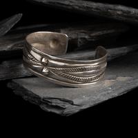 Early Navajo Chiseled Cuff Bracelet, with Repoussé Elements