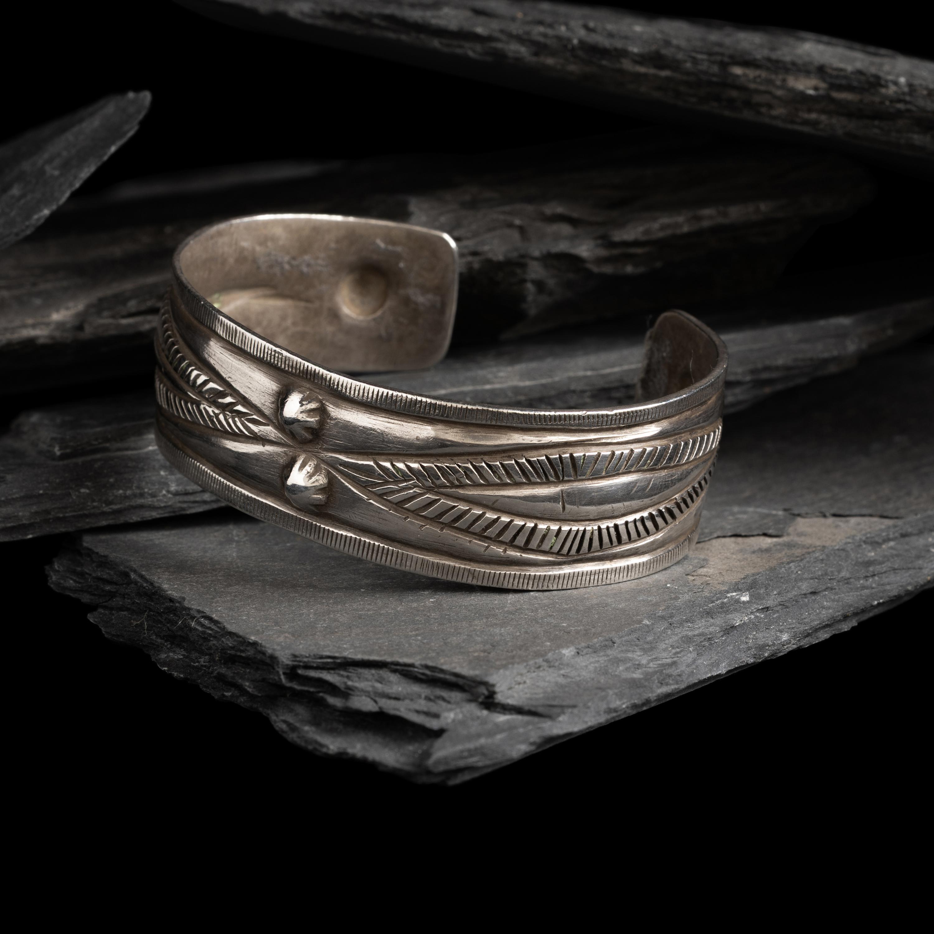 Early Navajo Chiseled Cuff Bracelet, with Repoussé Elements