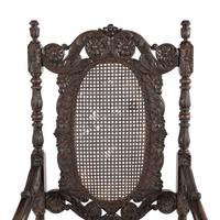 A William and Mary Style Carved Walnut Armchair