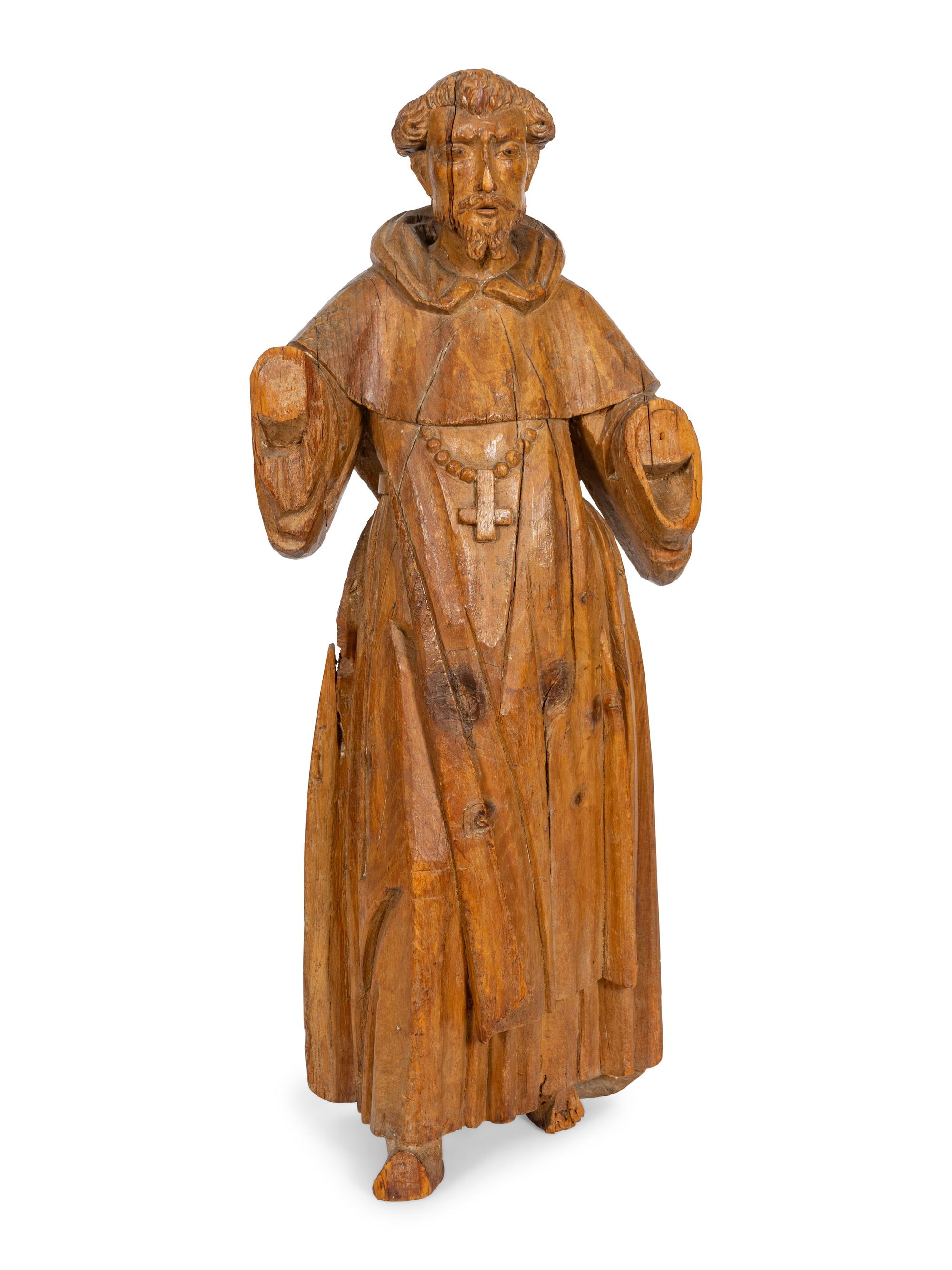 A Continental Carved Santos Figure