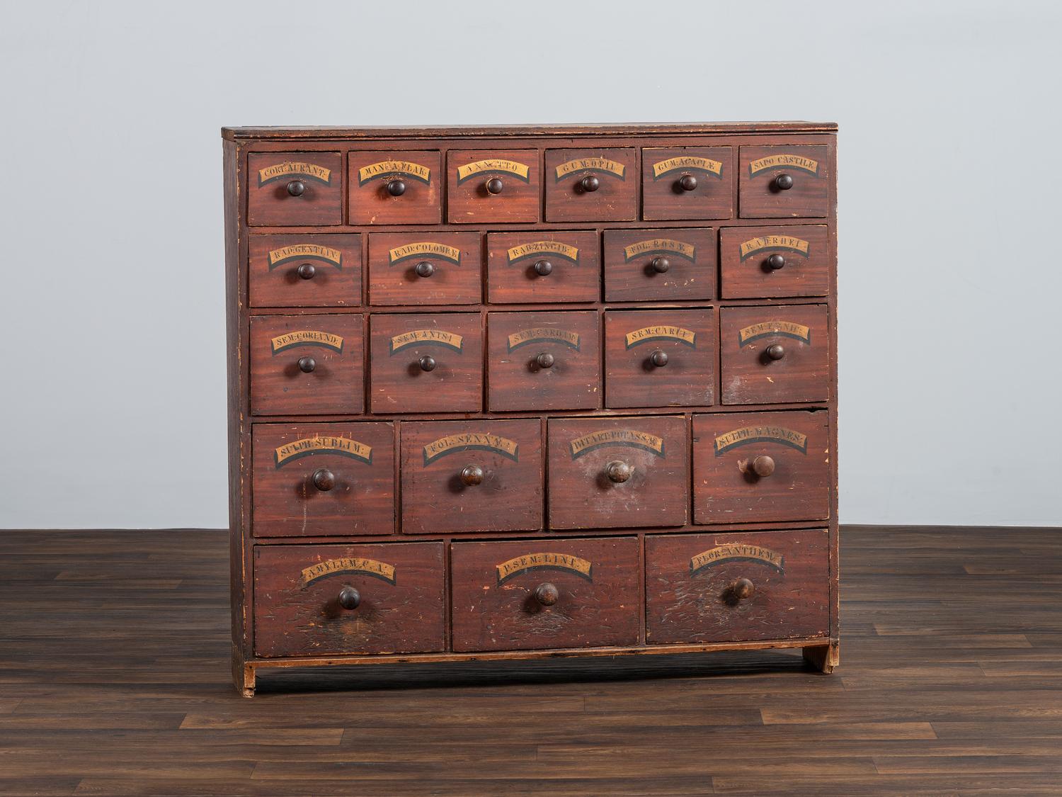 A Country Grain-Painted and Parcel Gilt Pine Apothecary Chest