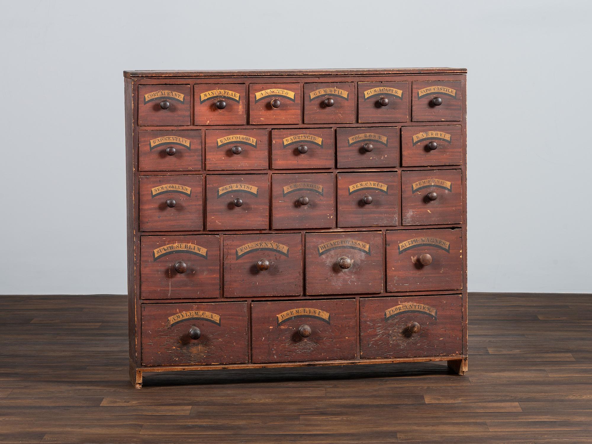 A Country Grain-Painted and Parcel Gilt Pine Apothecary Chest