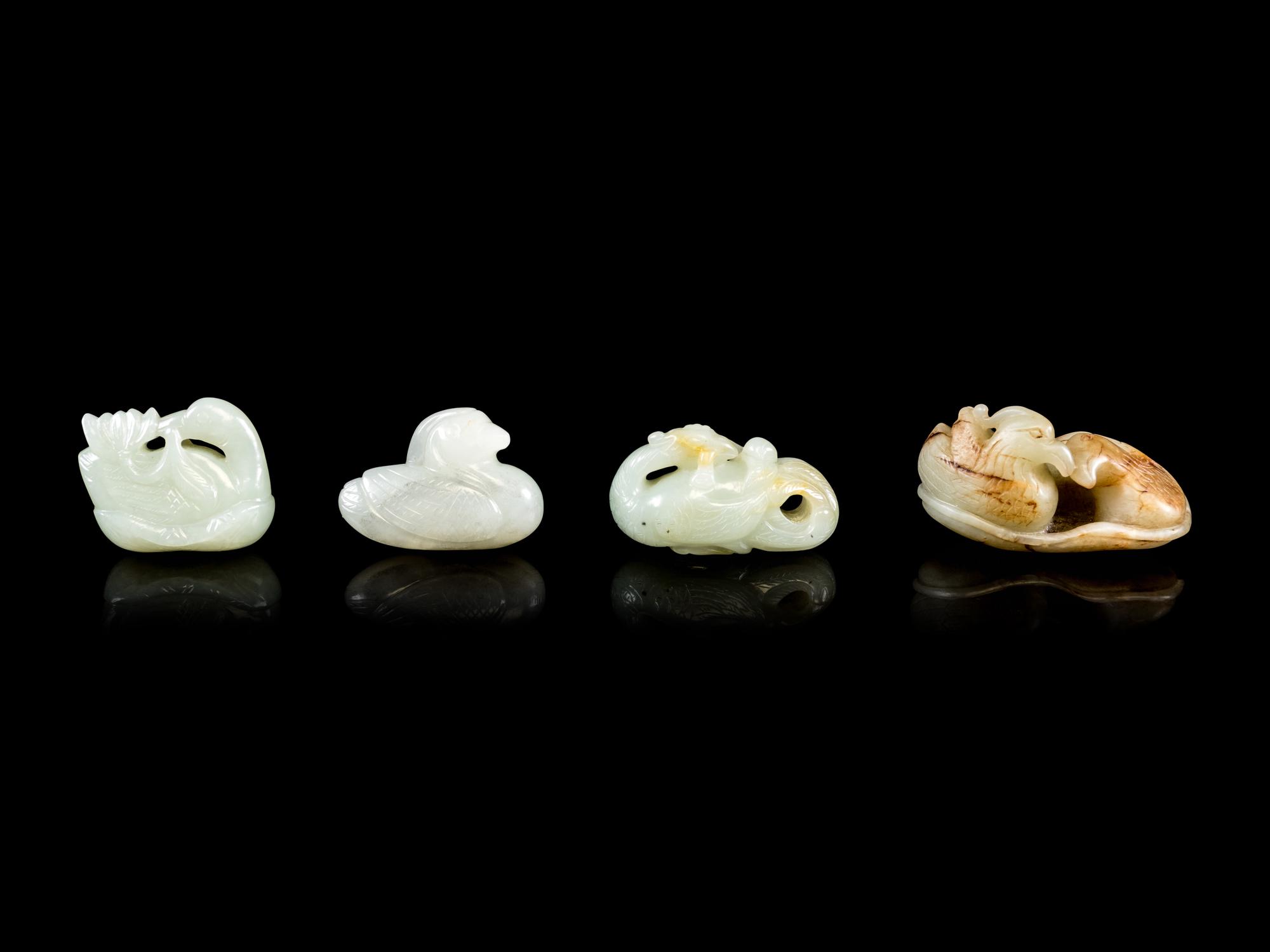 Four White and Celadon Jade Figures of Mandarin Duck