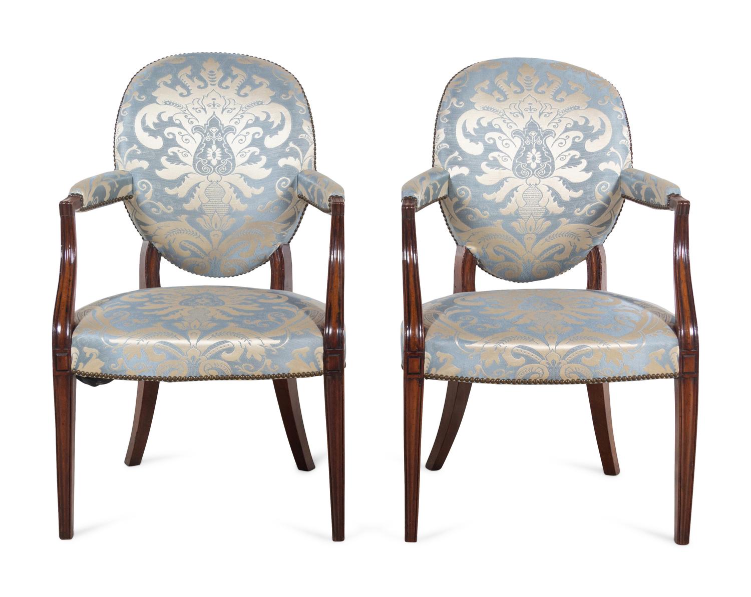 A Pair of George III Mahogany Armchairs