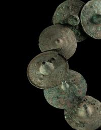 A Group of 15 Luristan Bronze Lids or Discs