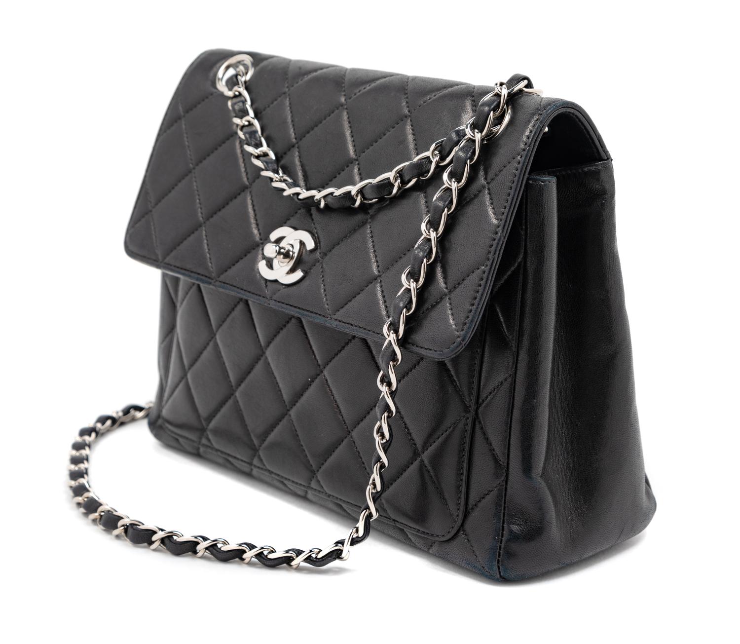 Chanel Black Quilted Leather Flap Bag, 2000-2002 9" L x 3.5" W x 7.5" H; strap drop: 9"- 17"