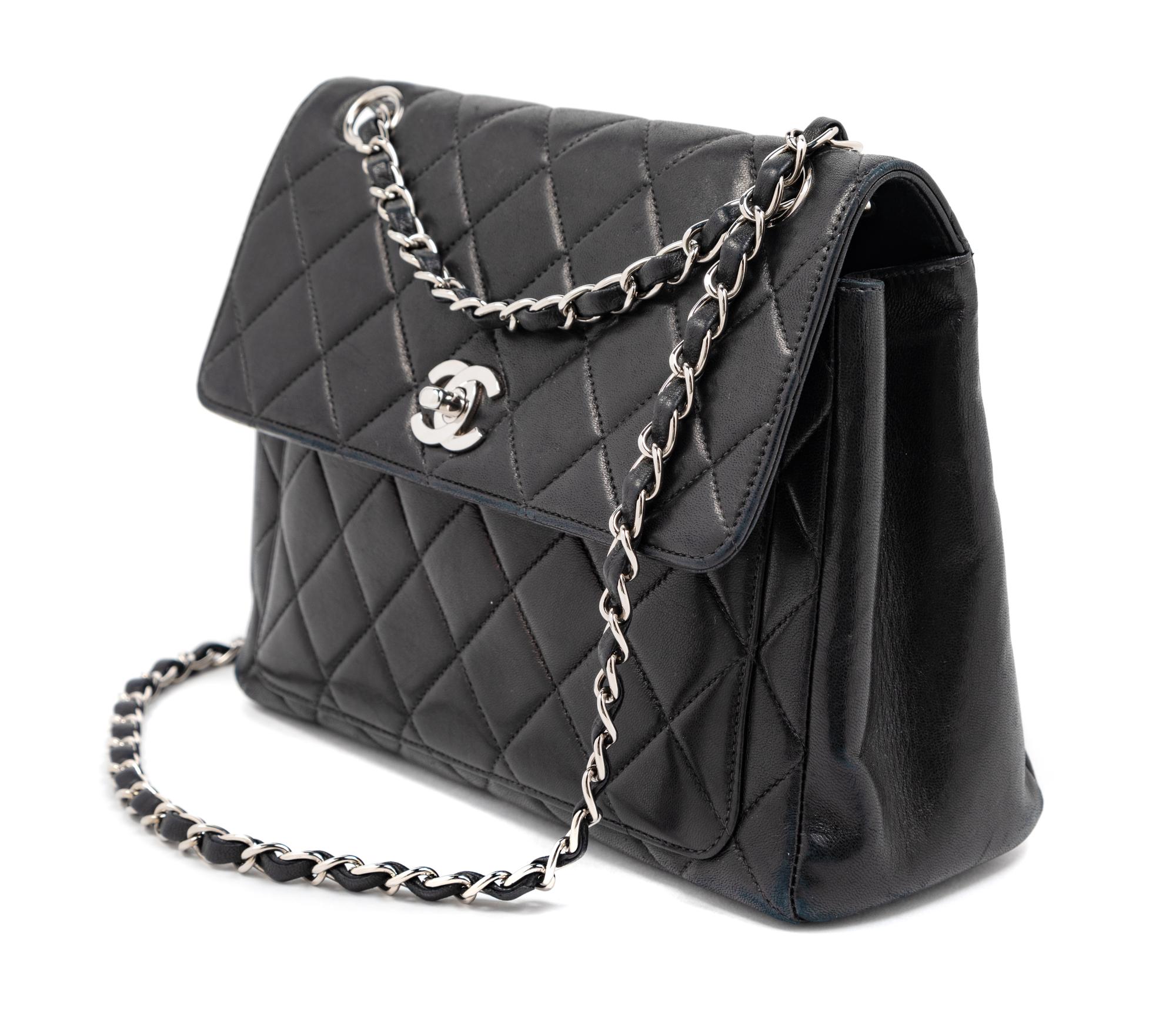 Chanel Black Quilted Leather Flap Bag, 2000-2002 9" L x 3.5" W x 7.5" H; strap drop: 9"- 17"
