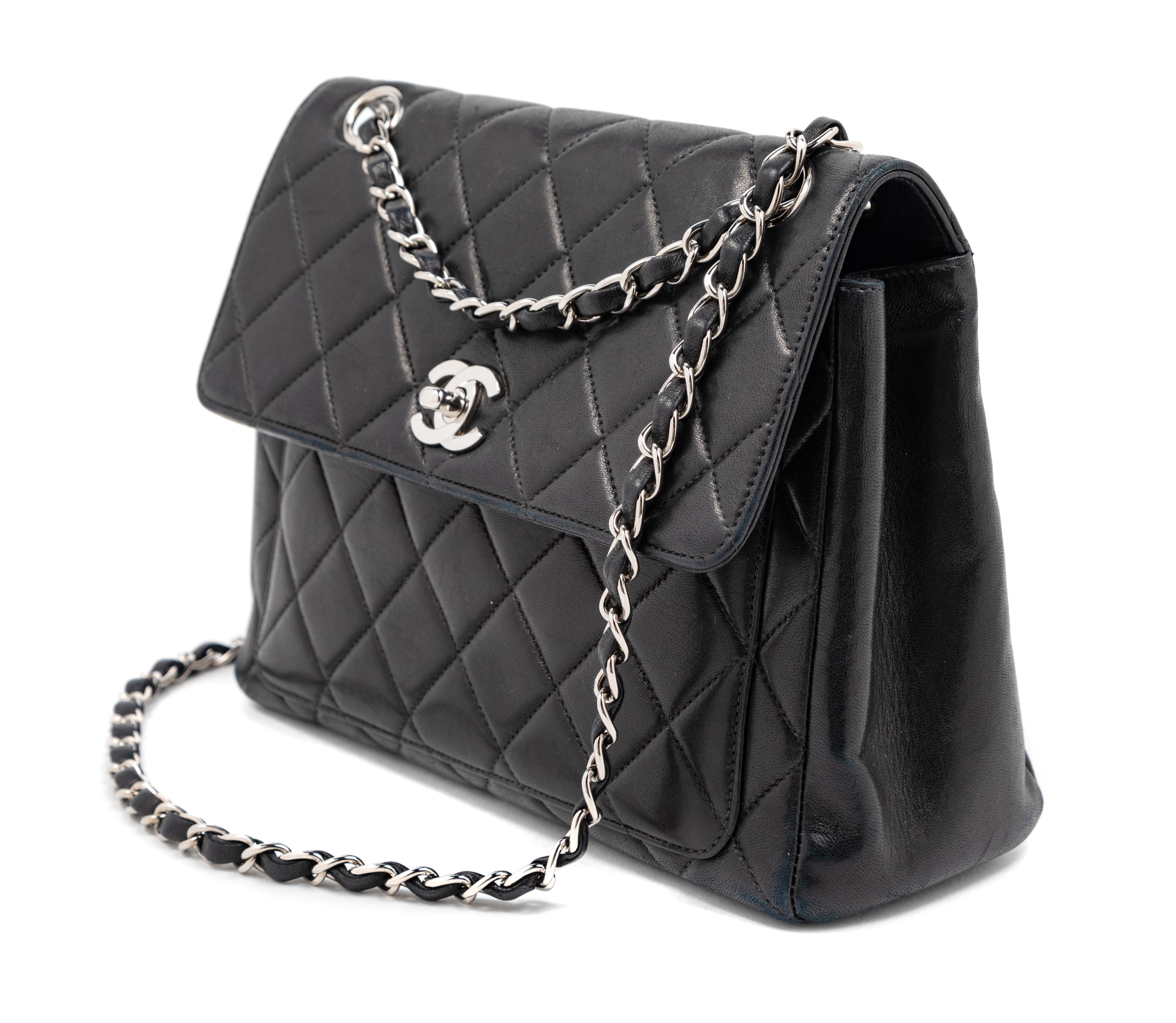 Chanel Black Quilted Leather Flap Bag, 2000-2002 9" L x 3.5" W x 7.5" H; strap drop: 9"- 17"