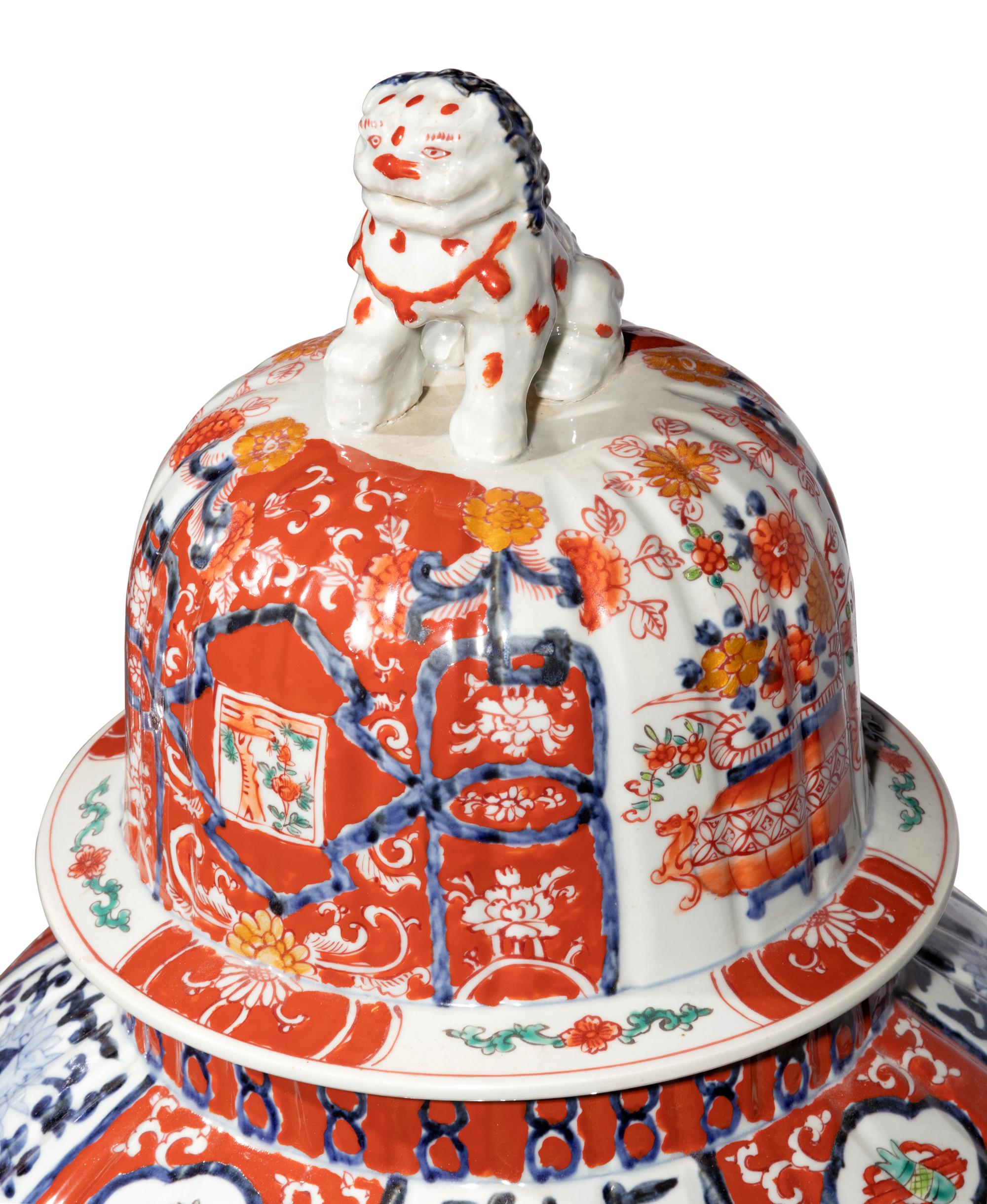 A Pair of Large Imari Palette Porcelain Jars with Wood Stands