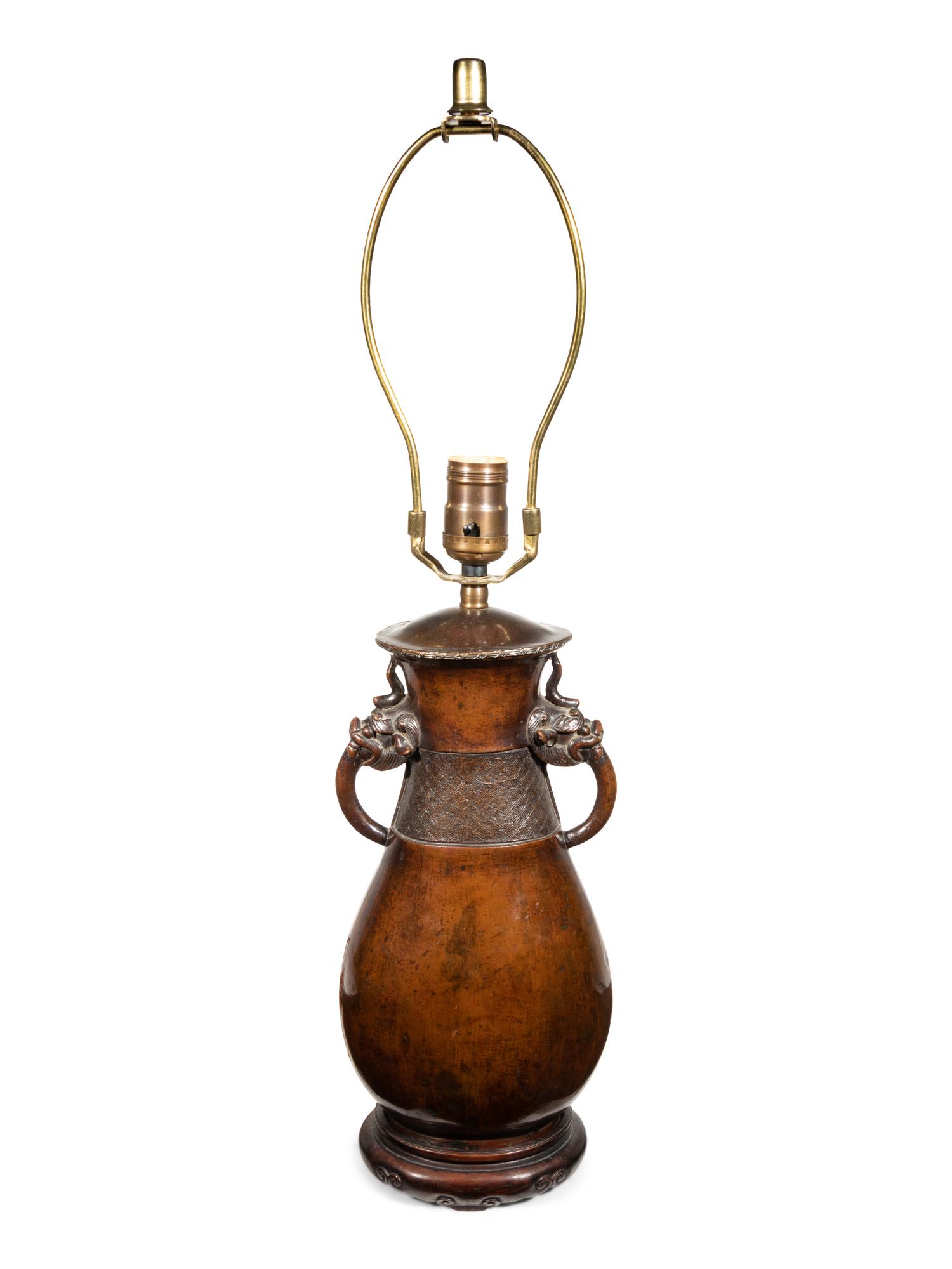 A Japanese Bronzed Metal Vase Mounted as a Lamp