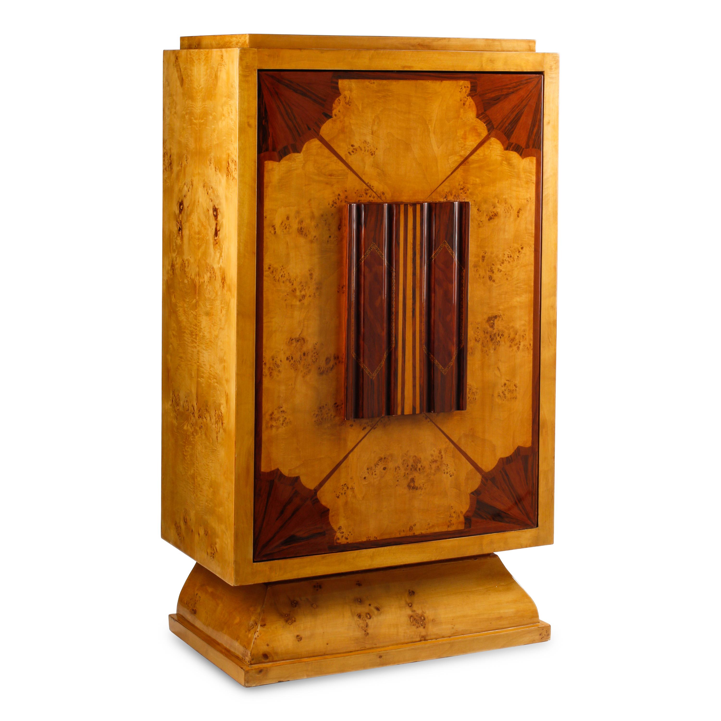 An Art Deco Style Burlwood Revolving Bar Cabinet