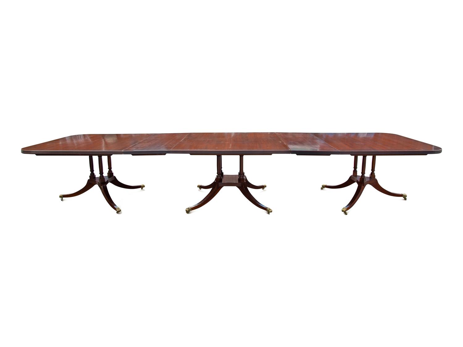 A Regency Style Walnut Dining Table