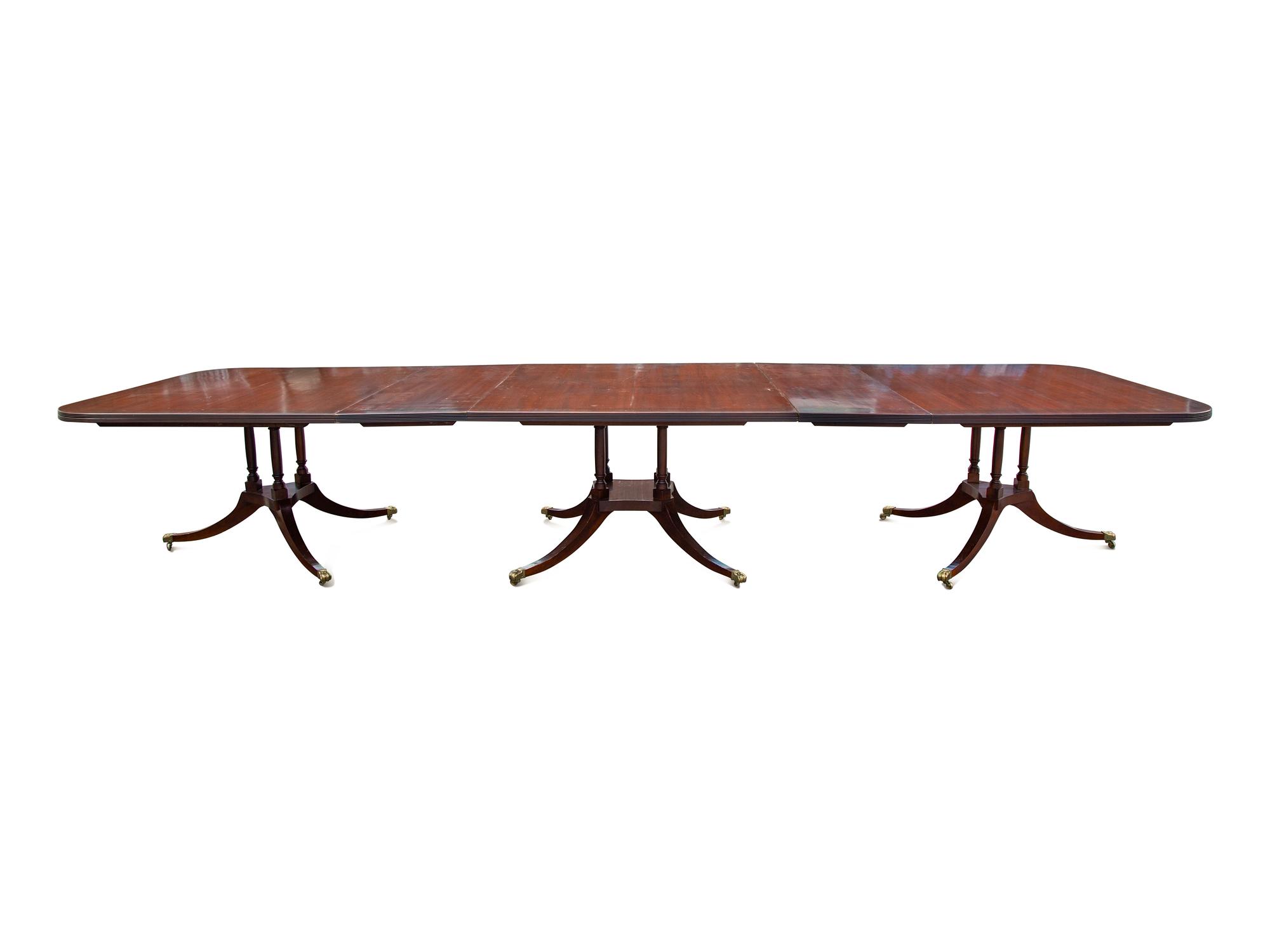 A Regency Style Walnut Dining Table