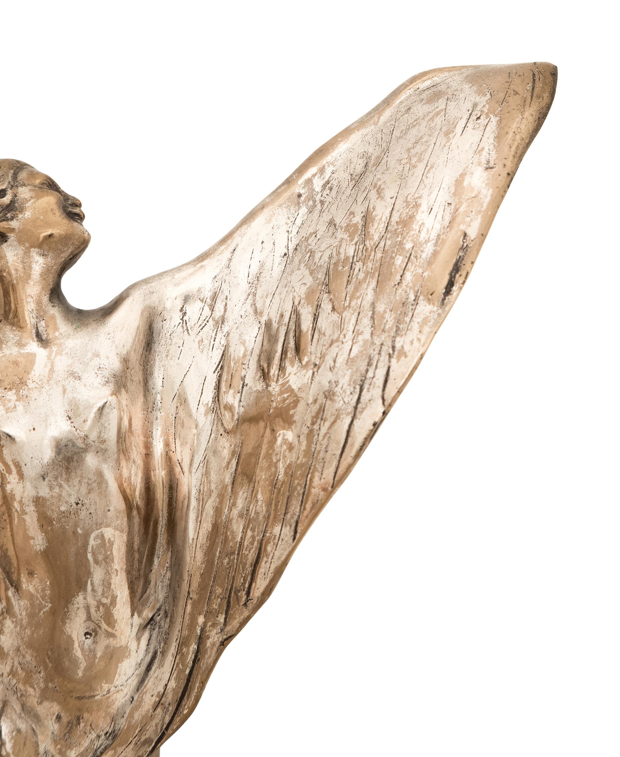An American Silver Trumpet Vase and A Silvered-Metal Figure of a Winged Dancer