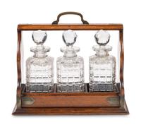 An English Oak and Cut Glass Tantalus
