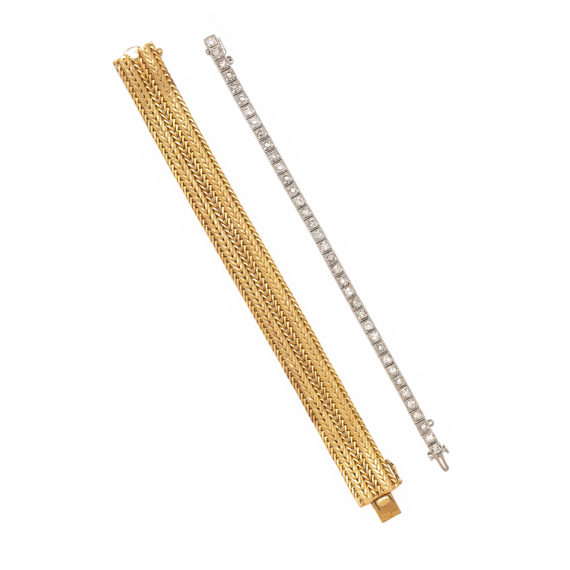 PLATINUM AND DIAMOND LINE BRACELET WITH A YELLOW GOLD JACKET