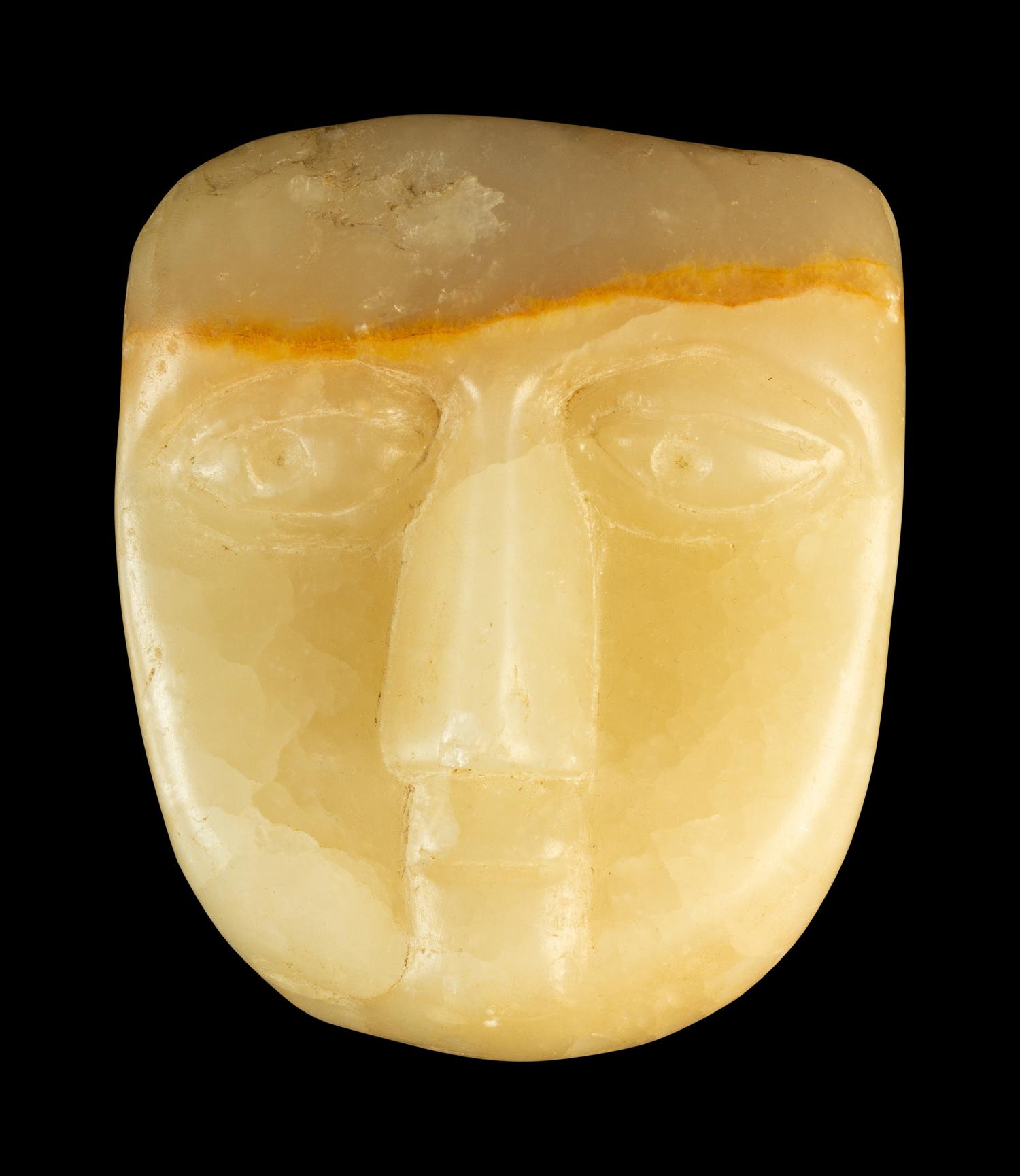 An Arabian Peninsula Carved Alabaster Mask