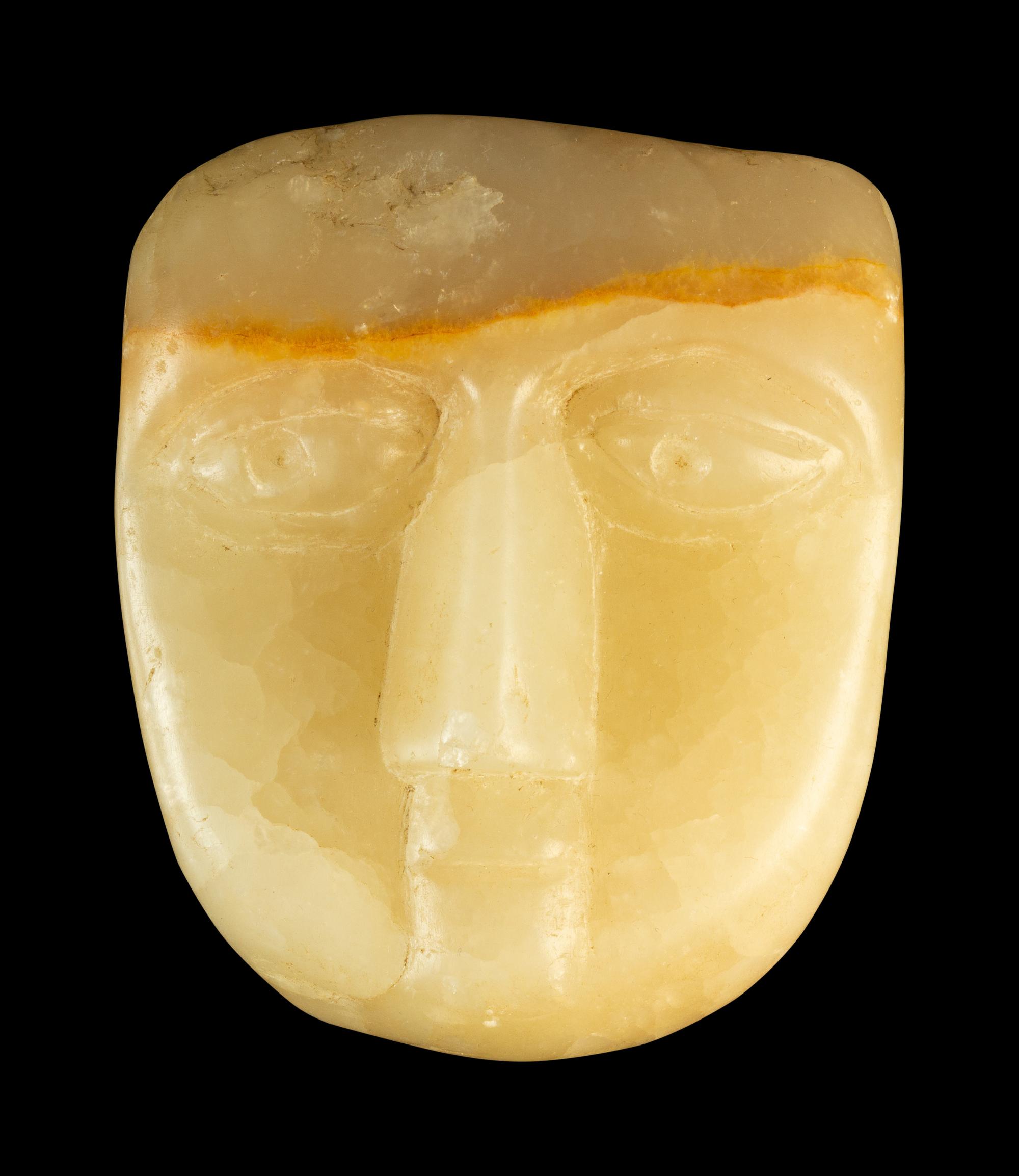 An Arabian Peninsula Carved Alabaster Mask