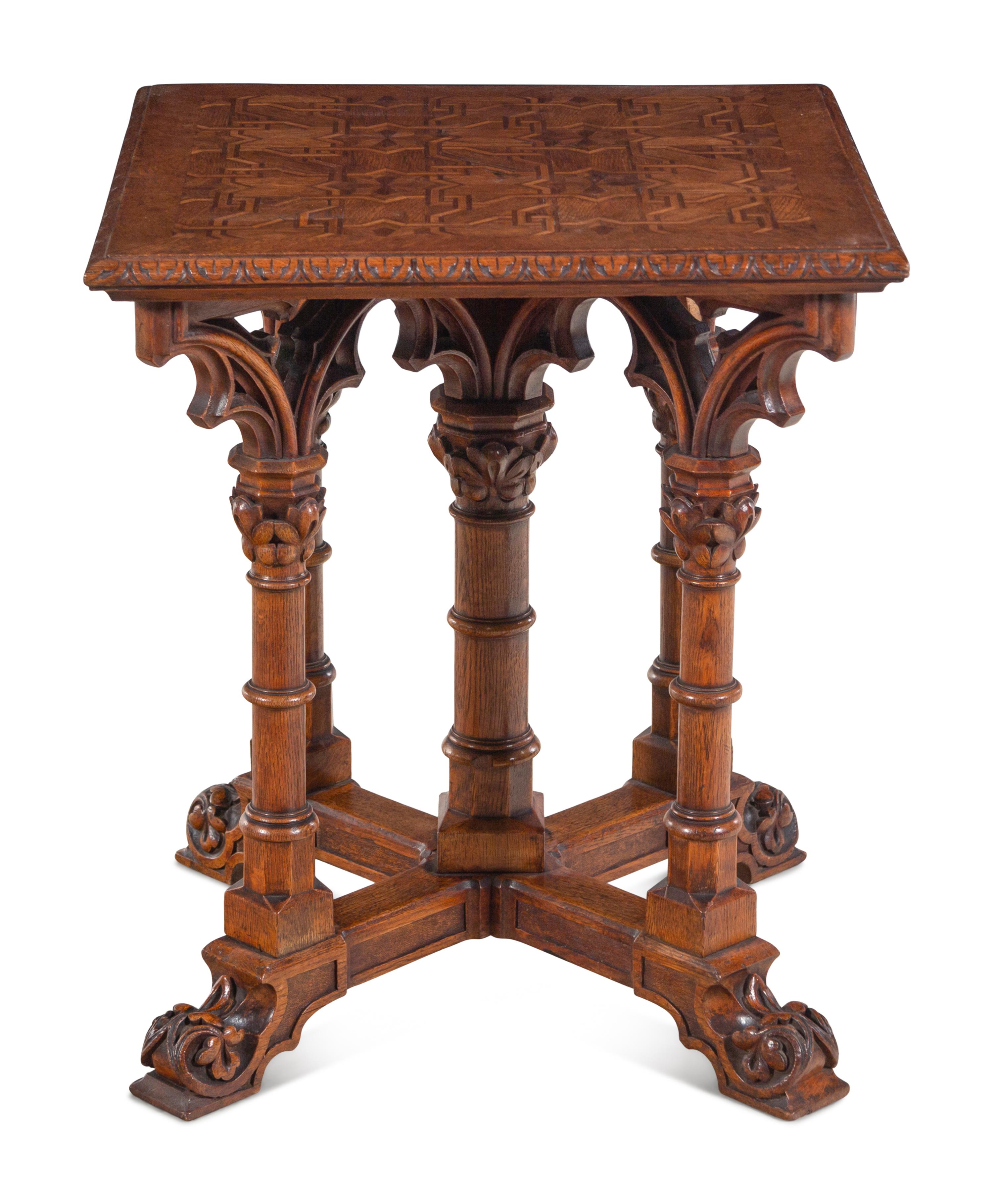 A Gothic Revival Walnut and Oak Parquetry Center Table by L. & S. Lövinson (German, active 19th Century)