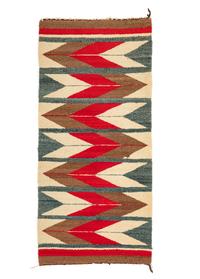 A Group of Navajo Weavings and Rugs