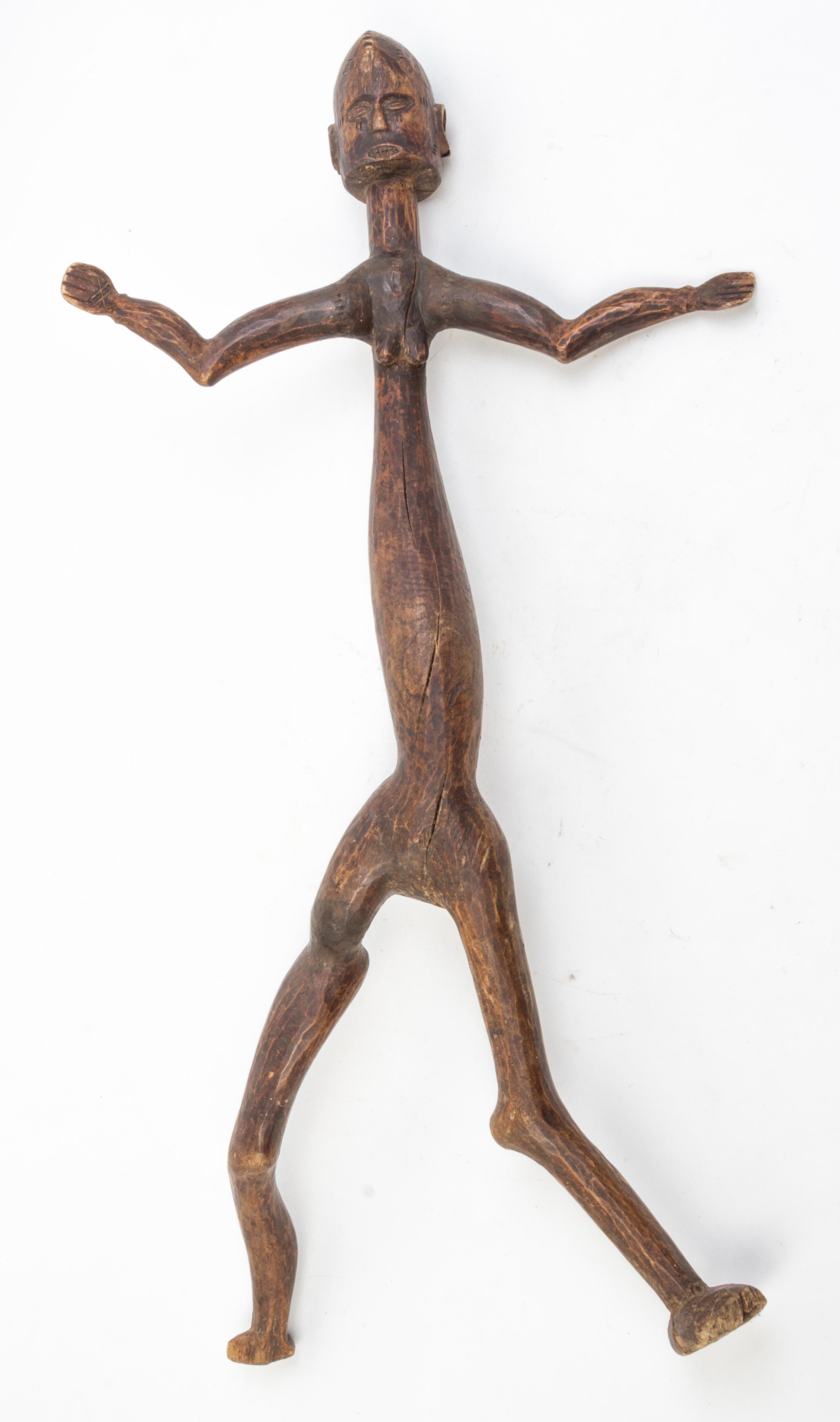 Four Wood Decorative Articles Height of tallest 34 inches.