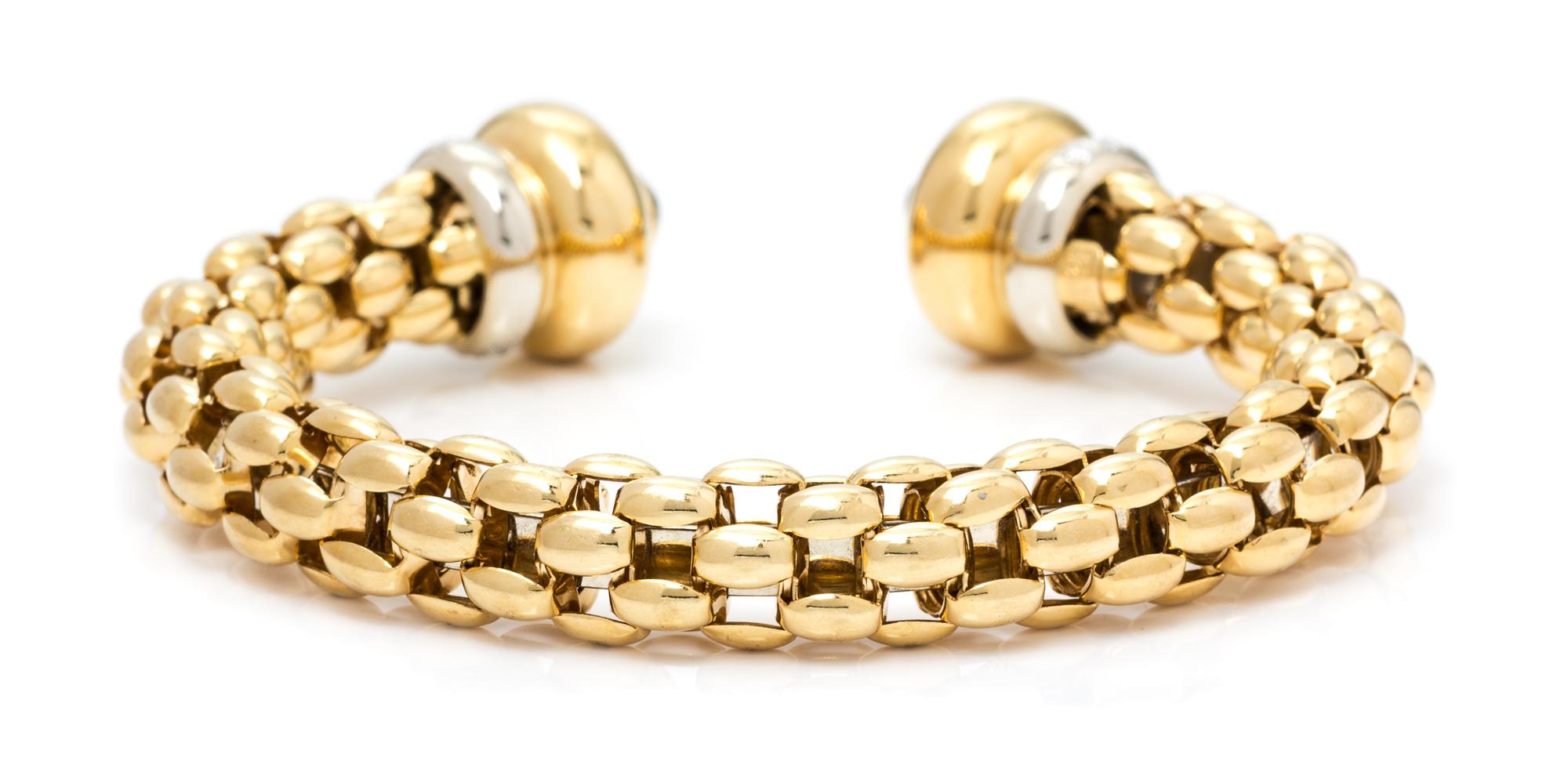 An 18 Karat Gold, Sapphire and Diamond Cuff Bracelet, FOPE, 33.60 dwts.