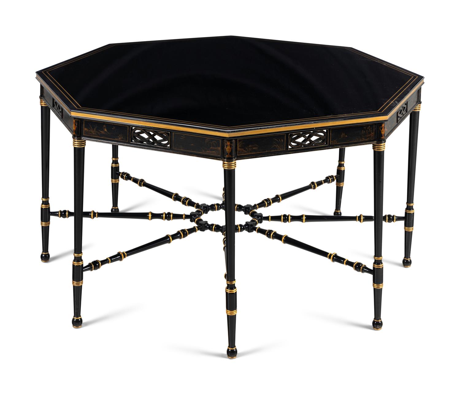 A Regency Style Ebonized and Parcel Gilt Center Table